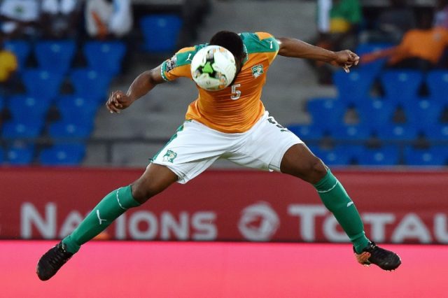 Ivory Coast's Wilfried Kanon heads the ball during their Africa Cup of Nations match again