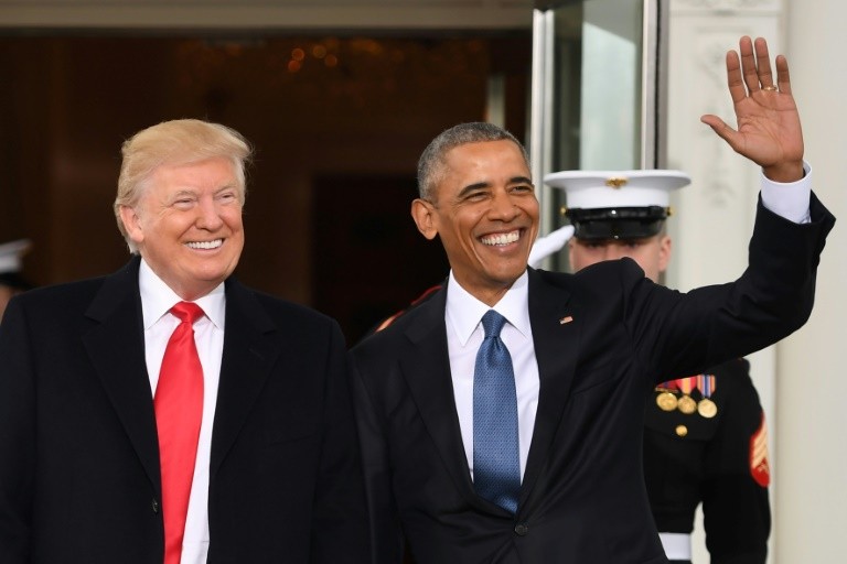 Barack Obama (right) pictured with Donald Trump at the White House in Washington, DC on January 20, 2017