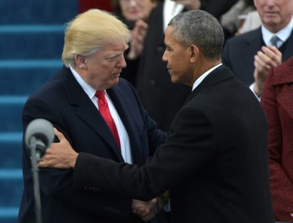 Former US President Barack Obama (right) greets President Donald Trump at the US Capitol i