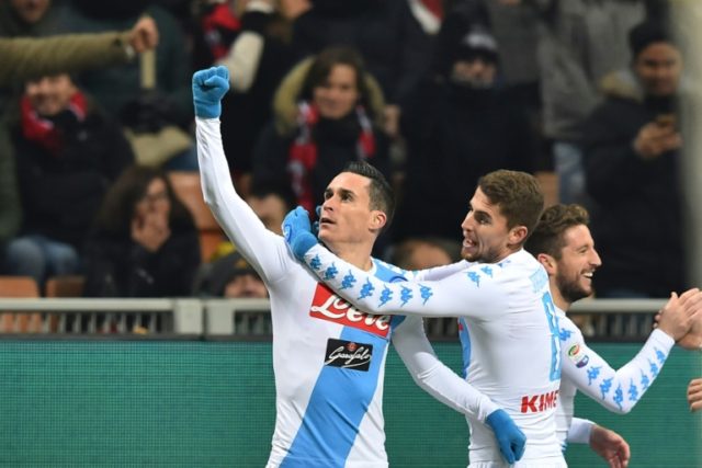 Napoli's midfielder Jose Maria Callejon (L) celebrates with teammates after scoring a goal