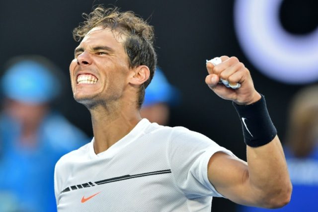 Spain's Rafael Nadal celebrates after a five-set victory against Germany's Alexander Zvere