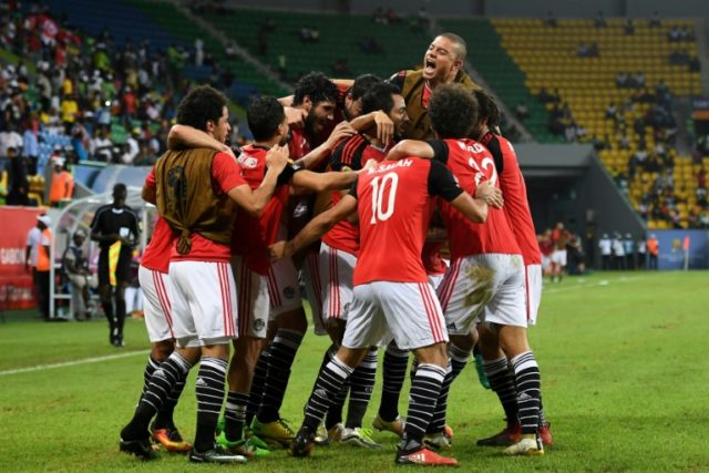 Egypt's players celebrate a goal on January 21, 2017