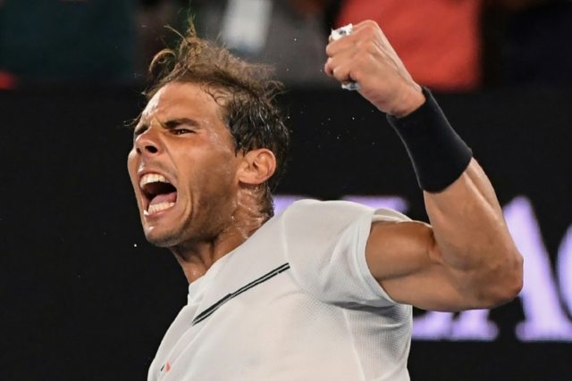 Rafael Nadal celebrates victory against Gael Monfils in the fourth round of the Australian