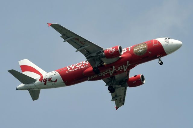 Low-cost AirAsia Airbus 320 plane prepares to land at Changi International airport in Sing