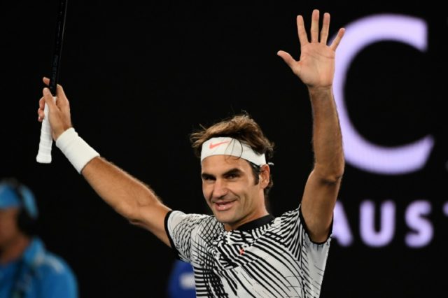 Switzerland's Roger Federer celebrates victory against Germany's Mischa Zverev in the Aust