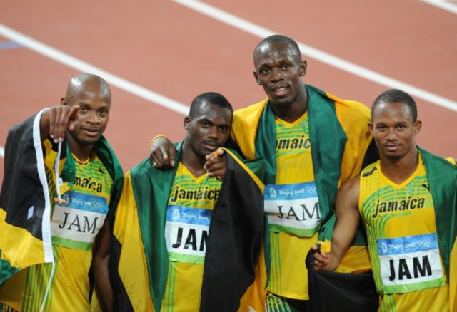 (L-R) Jamaica's Asafa Powell, Nesta Carter, Usain Bolt and Michael Frater celebrating afte