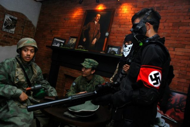 A portrait of Adolf Hitler hangs in the SoldatenKaffee (The Soldiers' Cafe) on Java Island