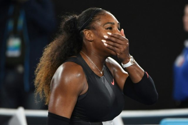 Serena Williams celebrates her victory against Venus Williams during the women's singles f
