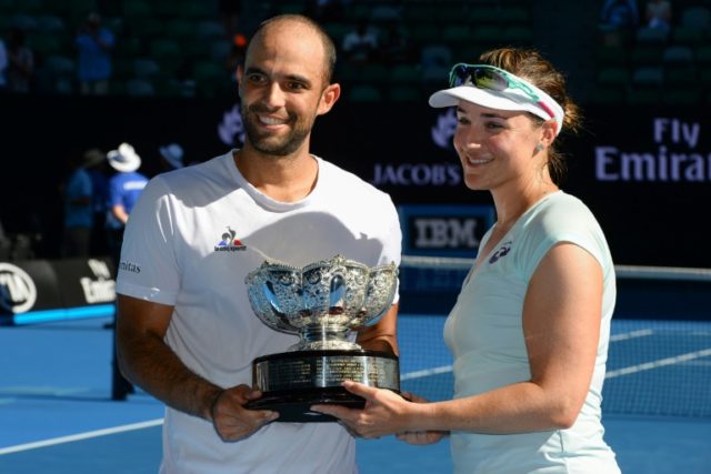 Abigail Spears and Juan Sebastian Cabal L) take their firs grand Slam mixed doubles title