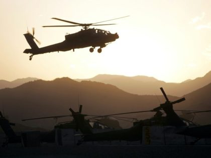 A dawn raid carried out by US drones and Apache helicopters killed 30 suspected Al-Qaeda m