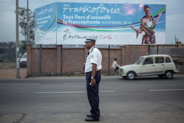 A Malagasy traffic policeman directs the traffic on the outskirts of Antananarivo on Novem