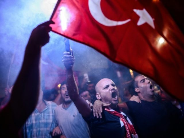 Supporters of President Recep Tayyip Erdogan rally in Istanbul's Taksim Square in July 201