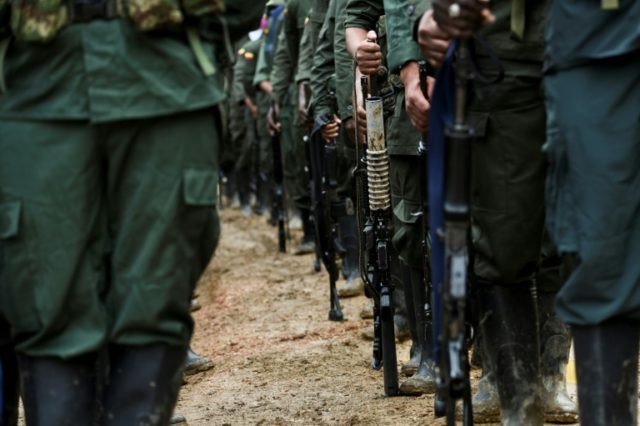 Members of the FARC are seen at the "Alfonso Artiaga" Front 29 FARC encampment in southwes