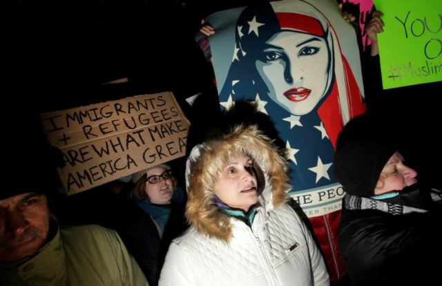 Demonstrators protest President Donald Trump's executive immigration ban at O'Hare Interna