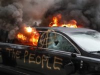 Fires, bricks mark daylong assault on inaugural festivities Photo AP Photo