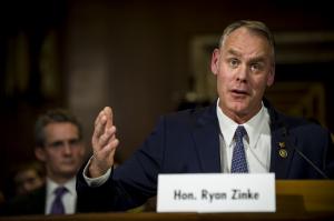 Zinke expresses some difference from Trump on climate change, Russia