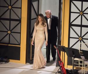 Melania Trump wears gold Reem Acra gown at pre-inauguration dinner