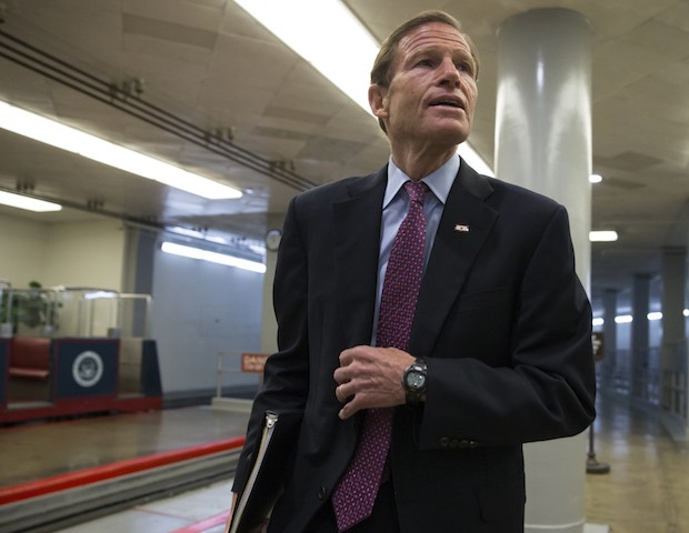 Sen. Richard Blumenthal, D-Conn., and other senators head to the chamber to vote as a resc