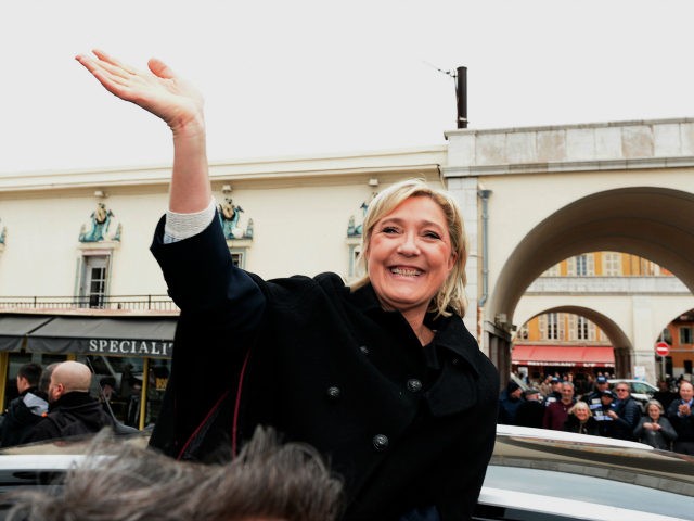 Far-right leader and presidential candidate Marine Le Pen waves in Nice where she paid hom