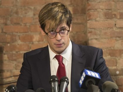 Milo Yiannopoulos speaks during a news conference, Tuesday, Feb. 21, 2017, in New York. Yiannopoulos has resigned as editor of Breitbart Tech after coming under fire from other conservatives over comments on sexual relationships between boys and older men. (AP Photo/Mary Altaffer)