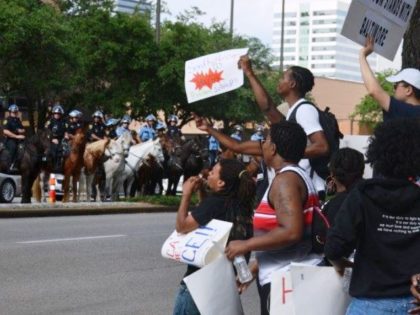 BLM-8-Protesters-stand-off-against-mounted-cops