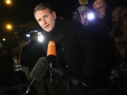 Bjoern Hoecke, co-head of the right-wing AfD (Alternative fuer Deutschland) political party in the state of Thuringia, speaks to reporters during an AfD vigil near the Chancellery for victims of the recent Berlin Christmas market terror attack on December 21, 2016 in Berlin, Germany. Right-wing groups are seeking to capitalize …