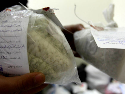 Syrian police show seized drugs and captagon pills at the Drug Enforcement Administration