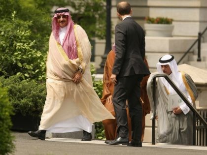 Crown Prince Mohammed bin Nayef and Deputy Crown Prince Mohammed bin Salman of Saudi Arabia are escorted by United States Chief of Protocol Peter Selfridge as they arrive at the White House May 13, 2015 in Washington, DC. The princes are scheduled to meet with President Barack Obama and Vice …