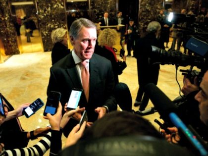 Sen. David Perdue, R-Ga., talks with reporters after meeting with President-elect Donald Trump at Trump Tower, Friday, Dec. 2, 2016, in New York. (AP Photo/Evan Vucci)