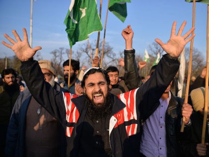 Pakistani supporters of the Jamaat-ud-Dawa (JuD) organisation shout slogans during a prote