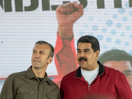 Venezuelan President Nicolas Maduro (R) and his vice-president Tareck El Aissami participa