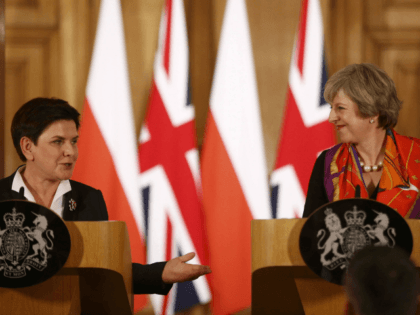 British Prime Minister Theresa May (R) and Polish Prime Minister Beata Szydlo attend a joint press conference following their meeting at 10 Downing Street in central London on November 28, 2016.