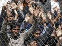 Migrants who will be returned to Turkey demonstrate inside the Moria registration centre on the Greek island of Lesbos visas