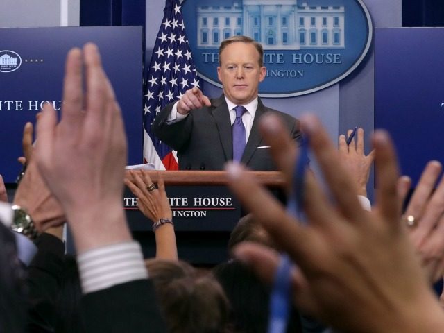 White House Press Secretary Sean Spicer reacts to reporters' questions in the Brady P