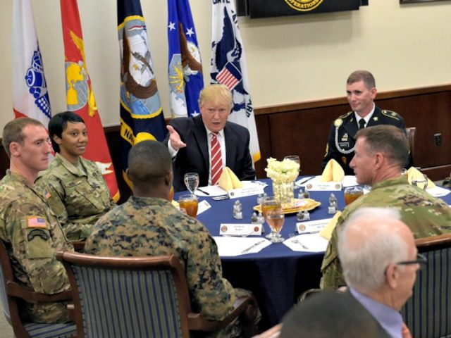 President Donald Trump has lunch with troops while visiting U.S. Central Command and U.S. Special Operations Command at MacDill Air Force Base, Fla., Monday, Feb. 6, 2017. Trump, who spent the weekend at Mar-a-Lago, is stoping for a visit to the headquarters before returning to Washington. (AP Photo/Susan Walsh)