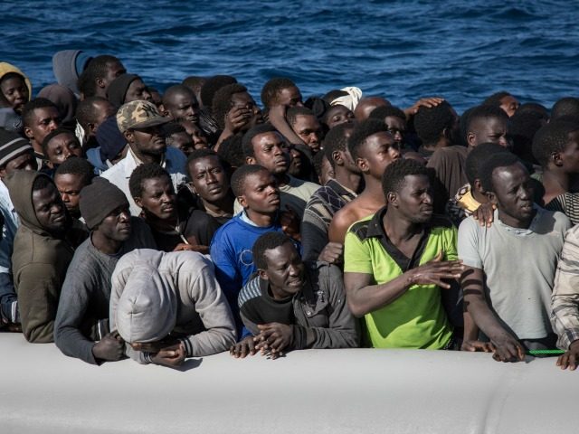 WATCH: Boatloads of Illegal Migrants Storm Spanish Tourist Beaches and Scatter