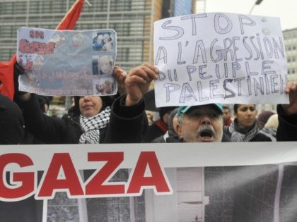 Protesters shout anti-Israeli slogans during a demonstration against the Israeli attacks on the Gaza Strip in front of the European headquarters on January 5, 2009 in Brussels. Some 100 Palestinian supporters called for the European Union to take action against Israel's military attack in Gaza, as EU envoys visited the …