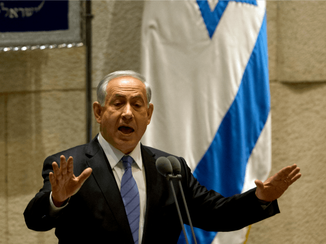 Israel's Prime Minister Benjamin Netanyahu speaks during the opening session of the K