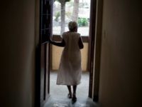 nursing home An elderly woman walks in a corridor at the Asile Commune home for the elderly in the Bel-Air slum of Port-au-Prince, Haiti, Friday Feb. 18, 2011. Things were supposed to be getting better at Asile Commune after the Jan. 2010 earthquake when British-based HelpAge assumed day-to-day management of the nursing …