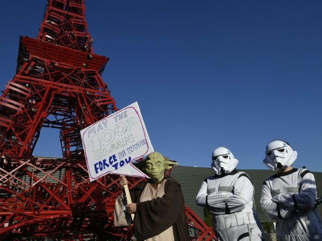 Avaaz activists protest during the COP21 United Nations climate conference