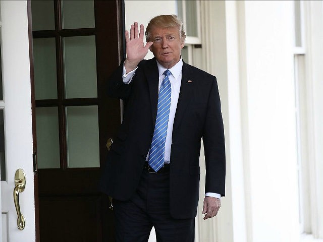 WASHINGTON, DC - FEBRUARY 15: U.S. President Donald Trump waves after escorting Israel Pri