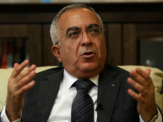 FILE - In this June 28, 2011 file photo, Palestinian Prime Minister Salam Fayyad speaks du