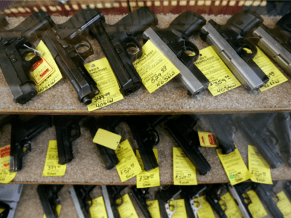 Handguns fill a display case at Red's Trading Post Feb. 12, 2008, in Twin Falls, Idaho. The gun shop, stripped of its license by the Bureau of Alcohol, Tobacco, Firearms and Explosives, had repeated chances to fix problems but failed to, bureau inspector John Hansen testified in federal court Tuesday, …