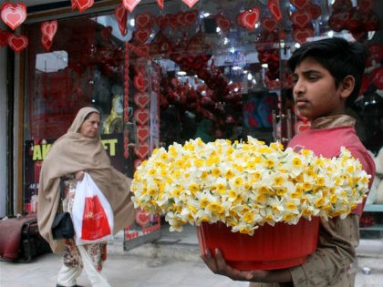PESHAWAR, Feb. 14, 2017 -- A boy sells flowers on Valentine's Day in northwest Pakistan's