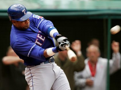 Texas Rangers' Sammy Sosa hits a solo home run off Cleveland Indians pitcher Paul Byrd in the top of the sixth inning of a baseball game Thursday, April 26, 2007, in Cleveland. Sosa set a major league record Thursday with home runs in his 44th ballpark at Jacobs Field. (AP …