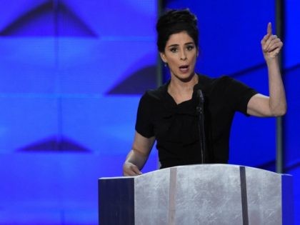 US Senator Al Franken (L) looks on as comedian Sarah Silverman speaks gestures during Day 1 of the Democratic National Convention at the Wells Fargo Center in Philadelphia, Pennsylvania, July 25, 2016. / AFP / SAUL LOEB (Photo credit should read SAUL LOEB/AFP/Getty Images)