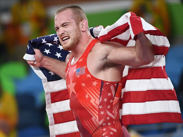 USA's Kyle Frederick Snyder celebrates after winning against Azerbaijan's Khetag Goziumov in their men's 97kg freestyle final match on August 21, 2016, during the wrestling event of the Rio 2016 Olympic Games at the Carioca Arena 2 in Rio de Janeiro. / AFP / Toshifumi KITAMURA (Photo credit should read …