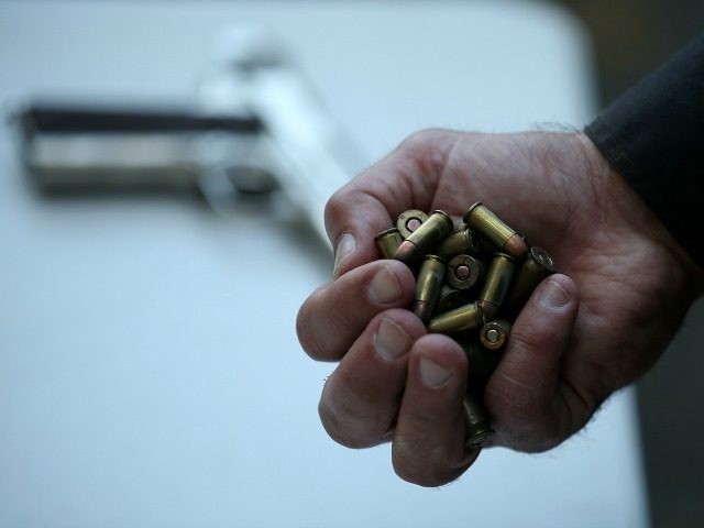 A San Francisco police officer holds a handful of ammunition that was surrendered during a gun buyback event on August 8, 2013 in San Francisco, California. Dozens of guns were turned in during a one-day gun buyback event in San Francisco's Mission District put on by San Francisco city officials. …