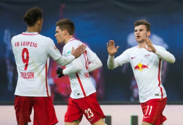 Leipzig's striker Timo Werner (R) celebrates after scoring with his teamate defender Marce
