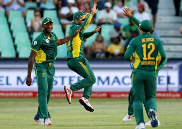 South African Faf du Plessis (C) celebrates the dismissal of Sri Lanka batsman Niroshan Di